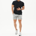 T-shirts et shorts de fitness en usage actif d&#39;été et shorts pour hommes de gym de gym